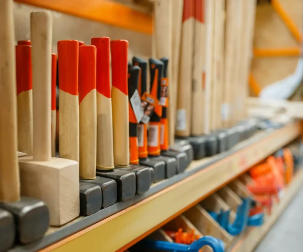 Hardware store assortment, shelf with hammers