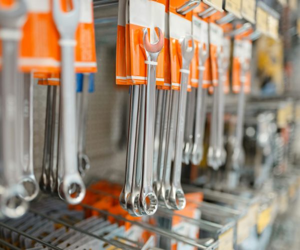 Rows of wrenches in hardware store closeup view