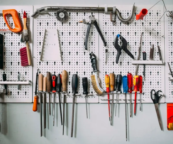 workshop-wall-of-various-tools-and-instruments.jpg
